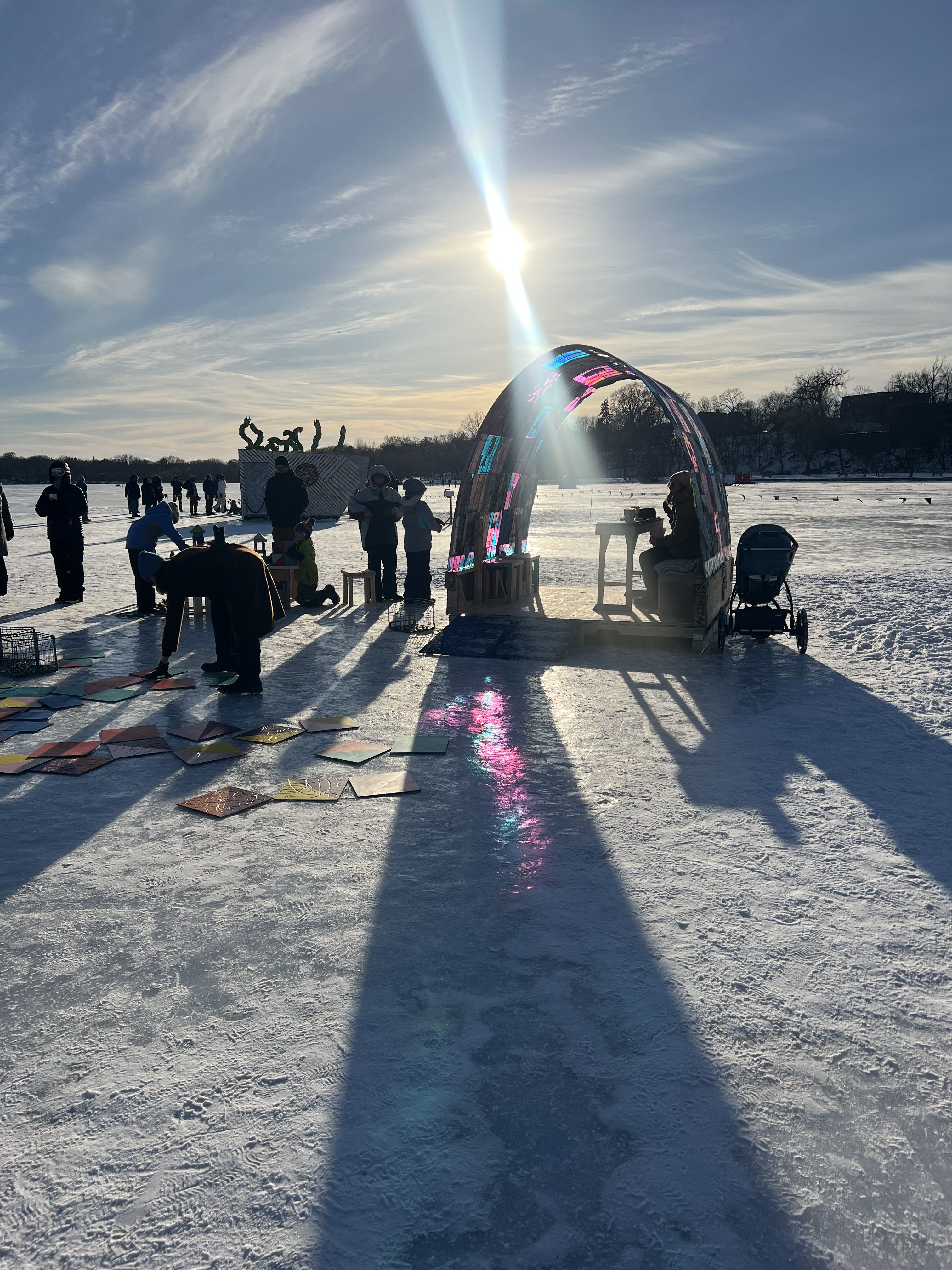 Stained glass art shanty, another art shanty in the distance with what look like tentacles